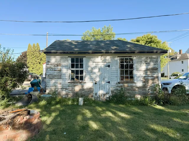 a view of a back yard of the house