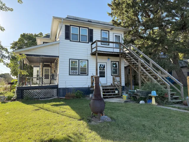 a front view of a house with a porch