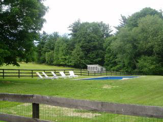 Turkey Hill Road, Unit 1135 Red Hook, NY 12571 - Photo 5 of 7 a view of a golf course with a lake