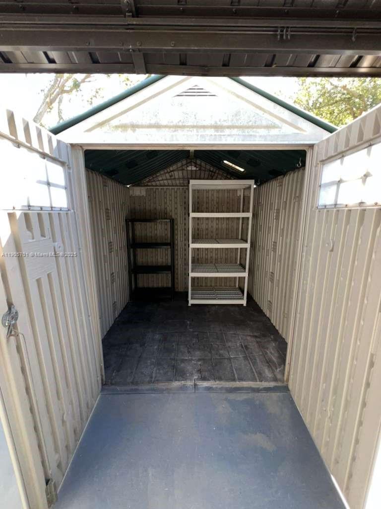 1799 Southwest 81st Terrace, Unit 135 Davie, FL 33324 - Photo 19 of 19 a view of room with a ceiling fan