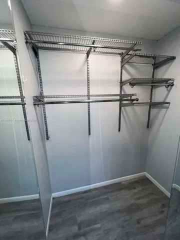 a view of a room with racks on the wall