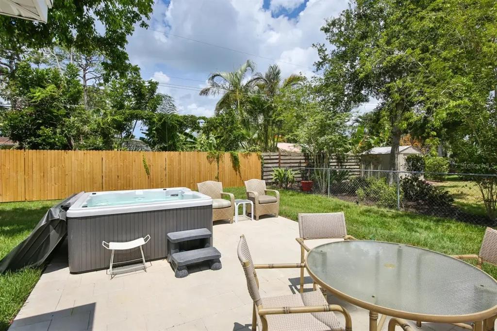 5622 South Lockwood Ridge Road Sarasota, FL 34231 - Photo 26 of 26 a view of a backyard with swimming pool