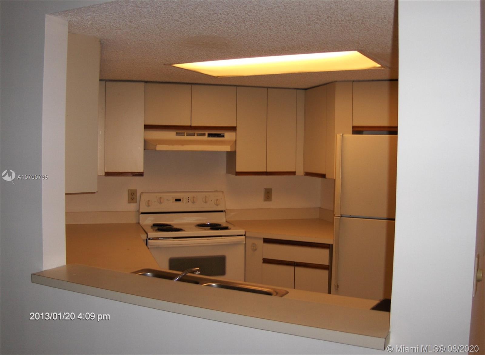 9727 Southwest 138th Avenue, Unit IC2L Miami, FL 33186 - Photo 11 of 44 Kitchen Open Pass Through to Living Areas
