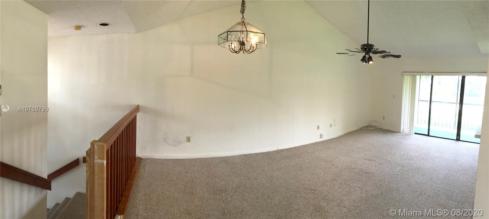 9727 Southwest 138th Avenue, Unit IC2L Miami, FL 33186 - Photo 14 of 44 Panorama View of Living,Dining & Stairway