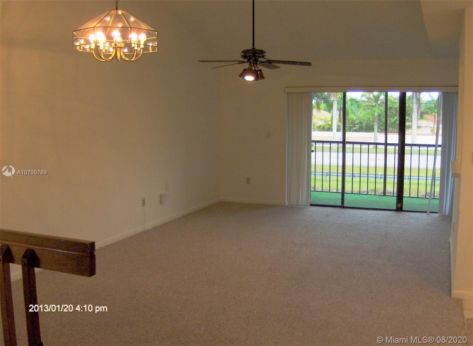 9727 Southwest 138th Avenue, Unit IC2L Miami, FL 33186 - Photo 16 of 44 Living and Dining Room