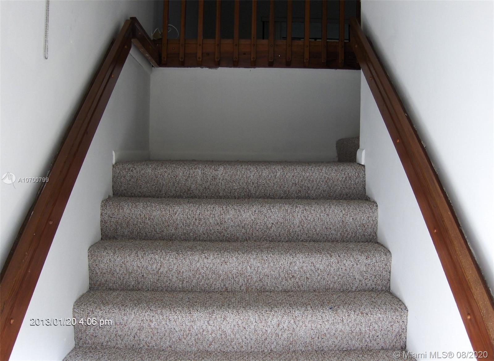 9727 Southwest 138th Avenue, Unit IC2L Miami, FL 33186 - Photo 17 of 44 Private Entry Stairway