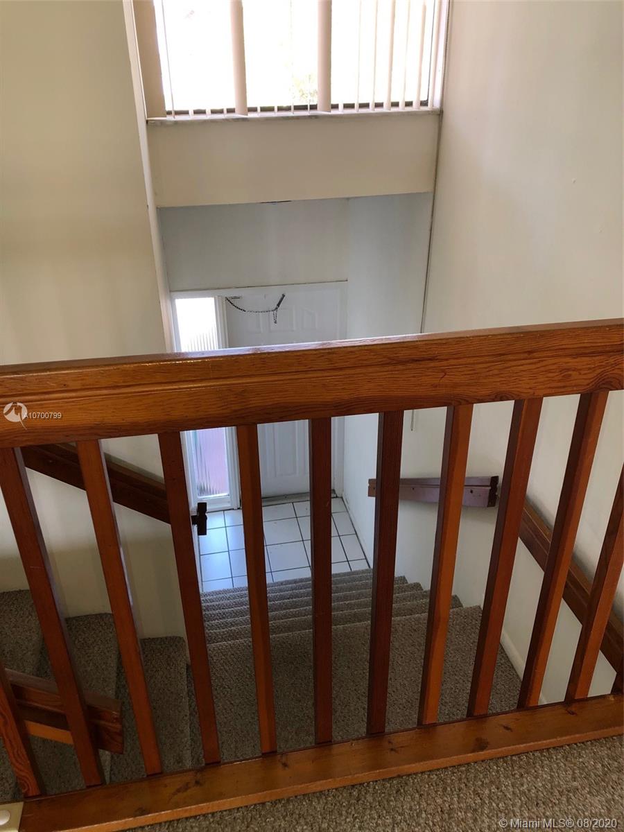 9727 Southwest 138th Avenue, Unit IC2L Miami, FL 33186 - Photo 18 of 44 Entry Stairway