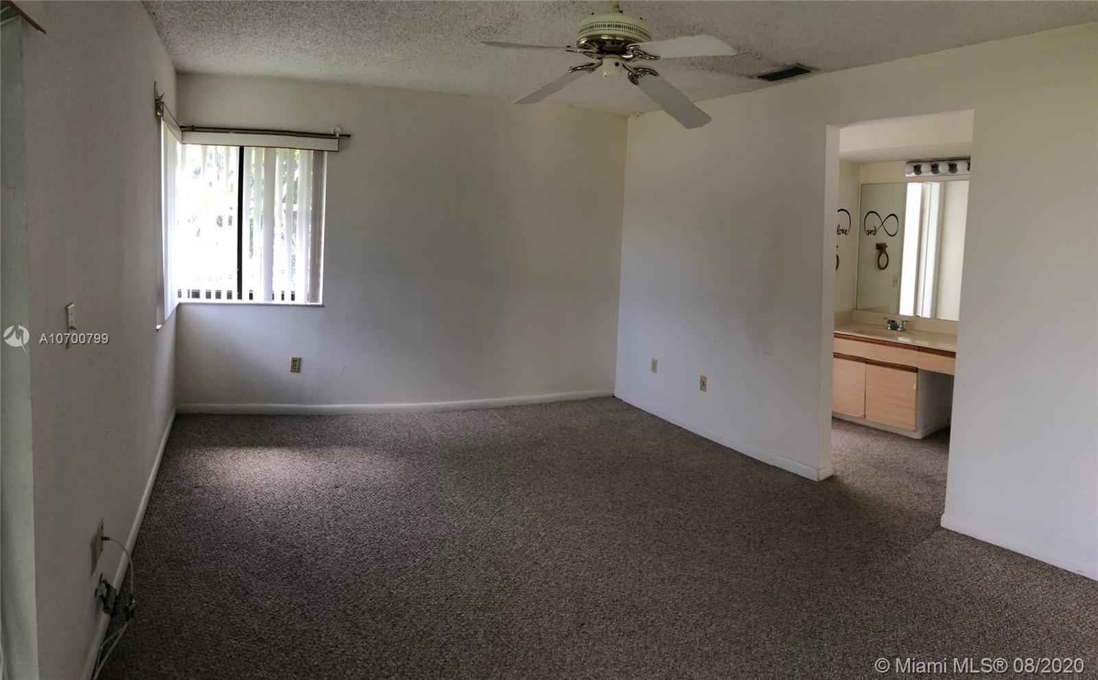 9727 Southwest 138th Avenue, Unit IC2L Miami, FL 33186 - Photo 20 of 44 Master Bedroom