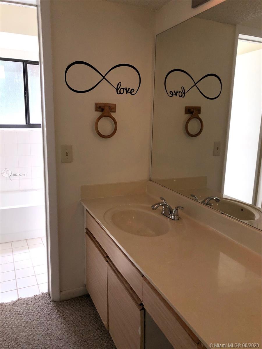 9727 Southwest 138th Avenue, Unit IC2L Miami, FL 33186 - Photo 23 of 44 Master Bath