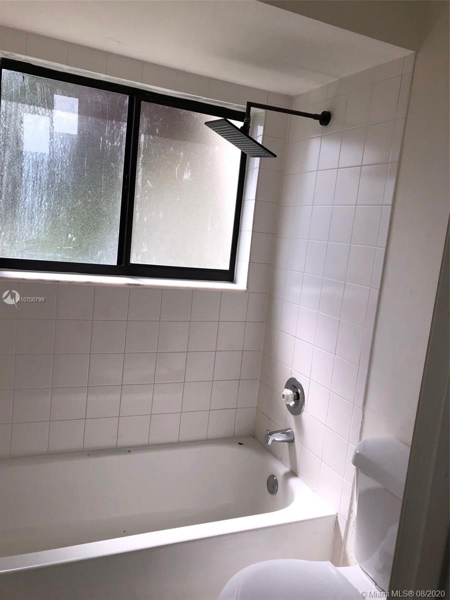 9727 Southwest 138th Avenue, Unit IC2L Miami, FL 33186 - Photo 24 of 44 Master Bath Rain Shower