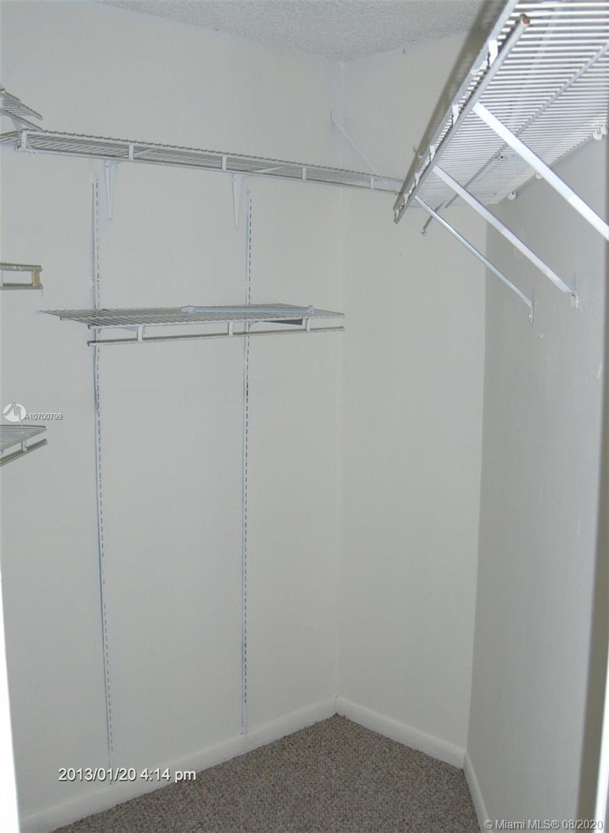 9727 Southwest 138th Avenue, Unit IC2L Miami, FL 33186 - Photo 26 of 44 Master Bedroom Walk-In Closet