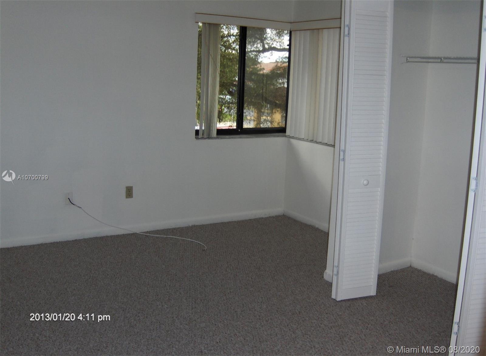 9727 Southwest 138th Avenue, Unit IC2L Miami, FL 33186 - Photo 28 of 44 Second Bedroom