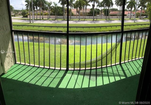 9727 Southwest 138th Avenue, Unit IC2L Miami, FL 33186 - Photo 31 of 44 Canal Balcony View