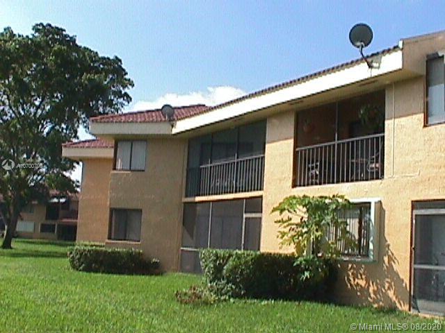9727 Southwest 138th Avenue, Unit IC2L Miami, FL 33186 - Photo 33 of 44 Back View and Screened Patio