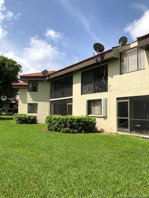 9727 Southwest 138th Avenue, Unit IC2L Miami, FL 33186 - Photo 34 of 44 Back View of Building
