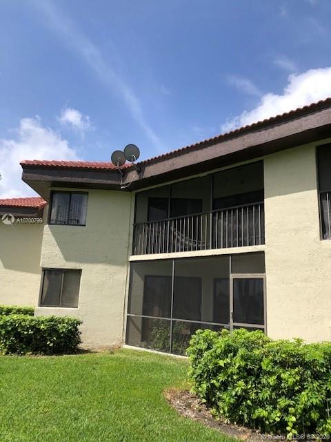 9727 Southwest 138th Avenue, Unit IC2L Miami, FL 33186 - Photo 35 of 44 Units Second Floor Screened Patio