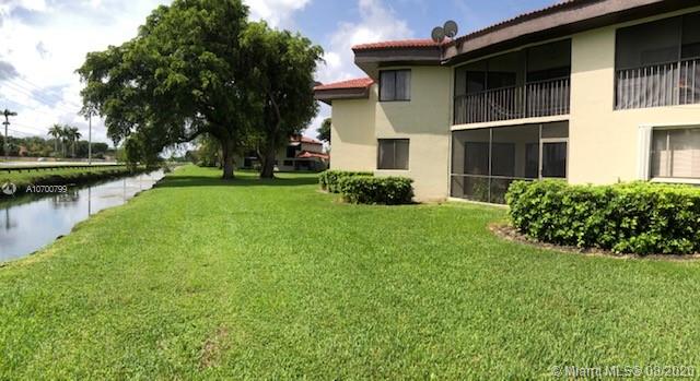 9727 Southwest 138th Avenue, Unit IC2L Miami, FL 33186 - Photo 36 of 44 Greenbelt and Canal