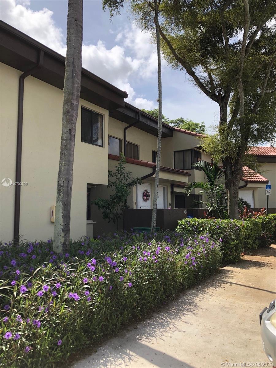 9727 Southwest 138th Avenue, Unit IC2L Miami, FL 33186 - Photo 5 of 44 Front Walkway