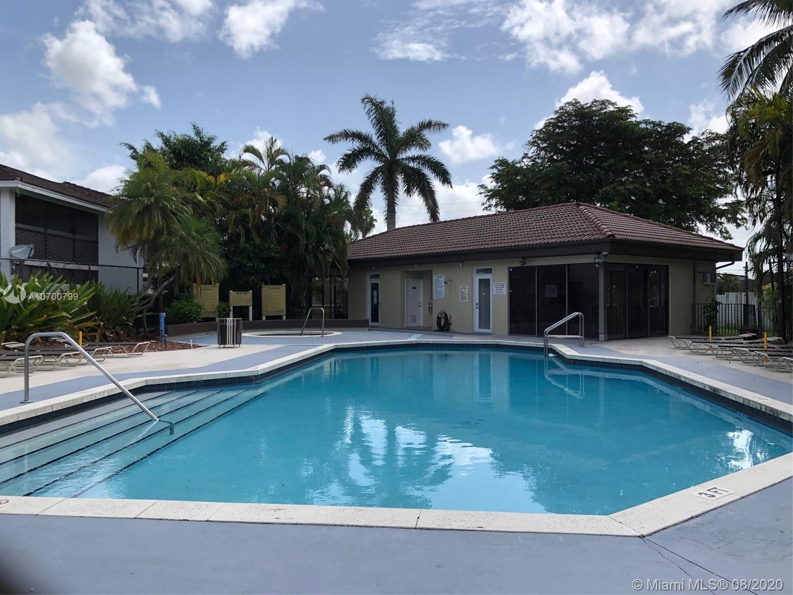 9727 Southwest 138th Avenue, Unit IC2L Miami, FL 33186 - Photo 8 of 44 Sparkling Community Pool
