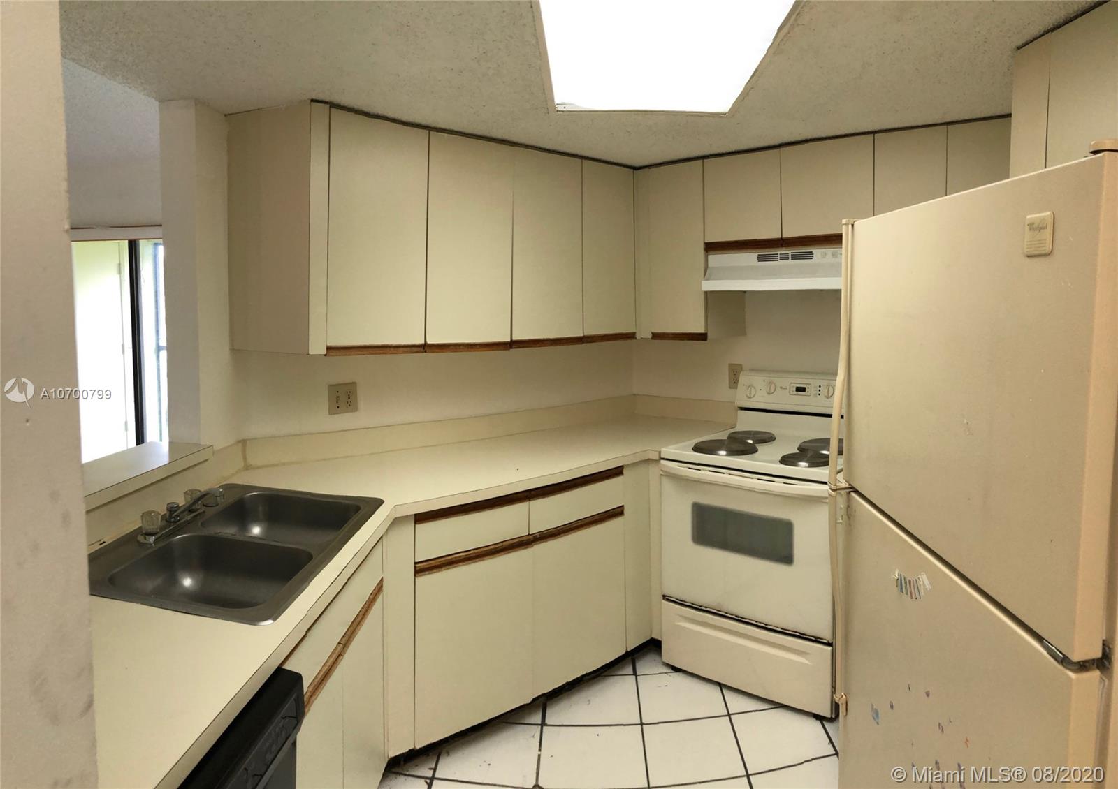 9727 Southwest 138th Avenue, Unit IC2L Miami, FL 33186 - Photo 9 of 44 Kitchen