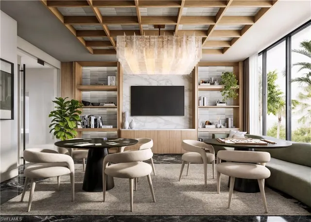 a living room with fireplace furniture and a flat screen tv