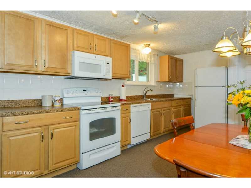 80 Mautucket Road South Kingstown, RI 02879 - Photo 4 of 15 Kitchen. Plenty of workspace and cabinets in the eat in kitchen.