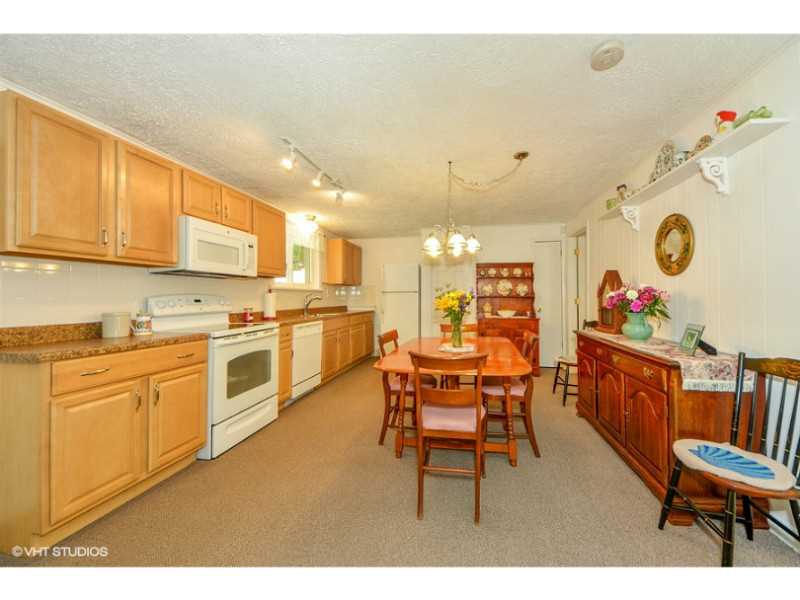 80 Mautucket Road South Kingstown, RI 02879 - Photo 6 of 15 Kitchen. View from living area to kitchen and dining.