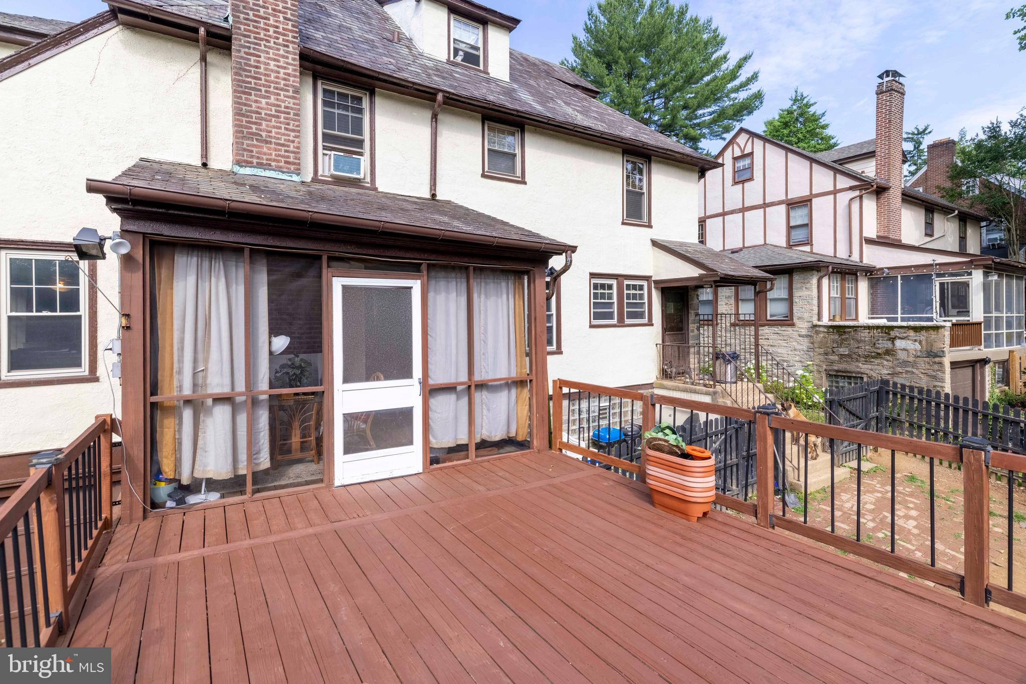 203 Hewett Road Wyncote, PA 19095 - Photo 34 of 47 Rear deck off of screened in porch