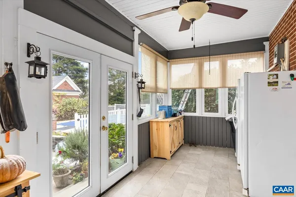 a open kitchen with stainless steel appliances granite countertop a stove and a refrigerator