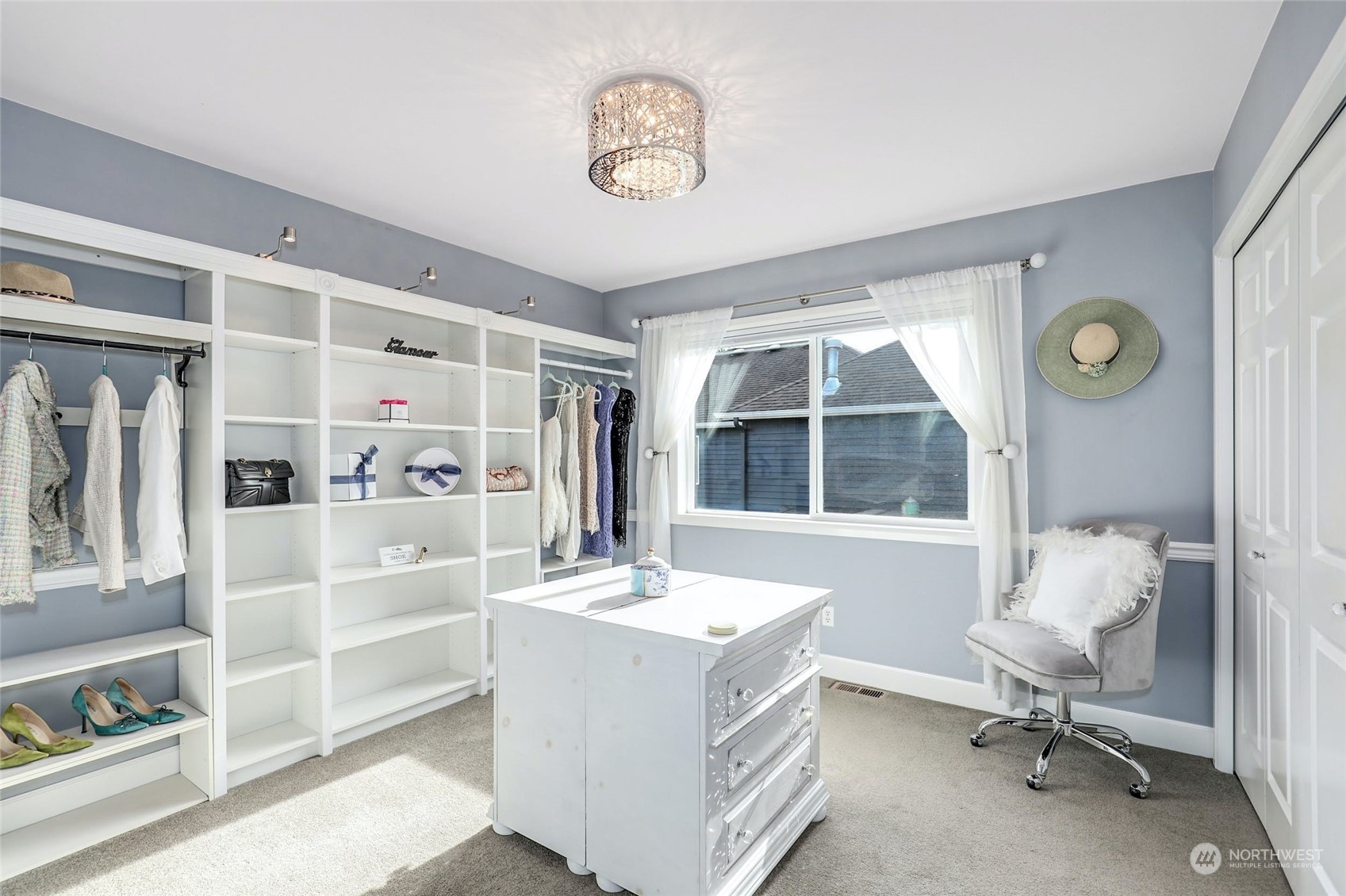 20813 37th Avenue Southeast Bothell, WA 98021 - Photo 30 of 36 a view of a workspace with furniture and a window