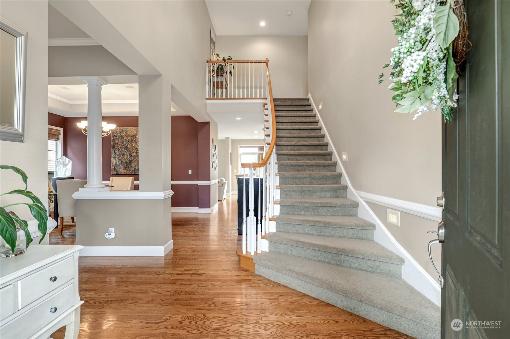 20813 37th Avenue Southeast Bothell, WA 98021 - Photo 3 of 36 a view of entryway and hall with wooden floor