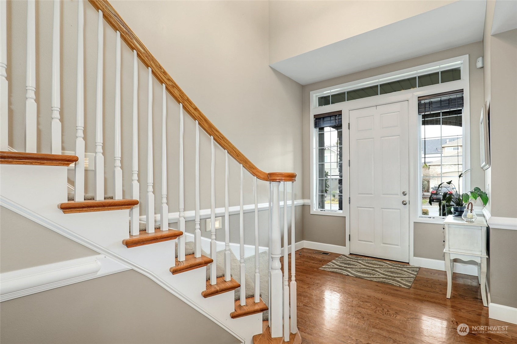 20813 37th Avenue Southeast Bothell, WA 98021 - Photo 4 of 36 a view of entryway and hall with wooden floor