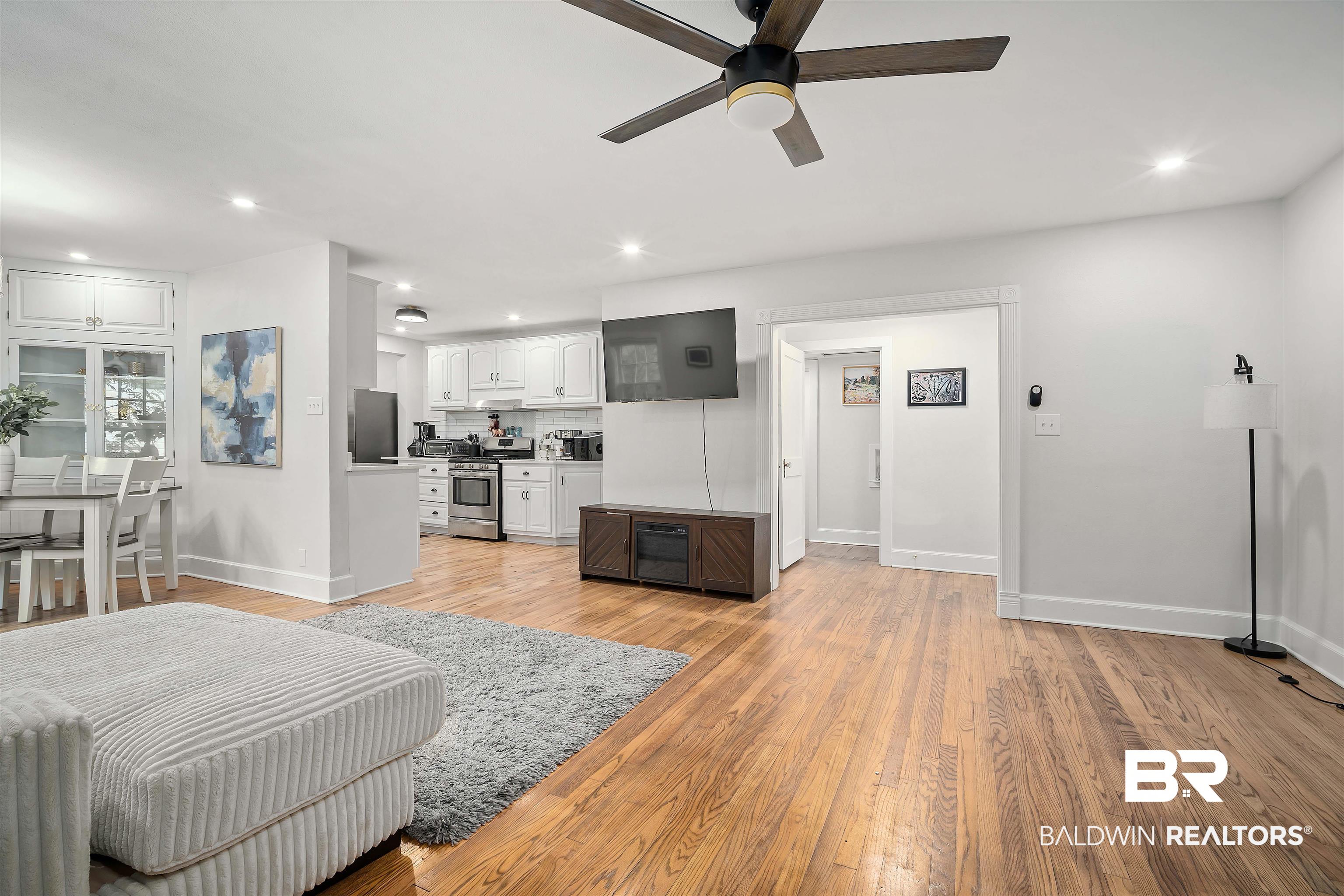 103 Emogene Place Mobile, AL 36606 - Photo 9 of 32 Living area with light wood-style flooring, ceiling fan, and recessed lighting