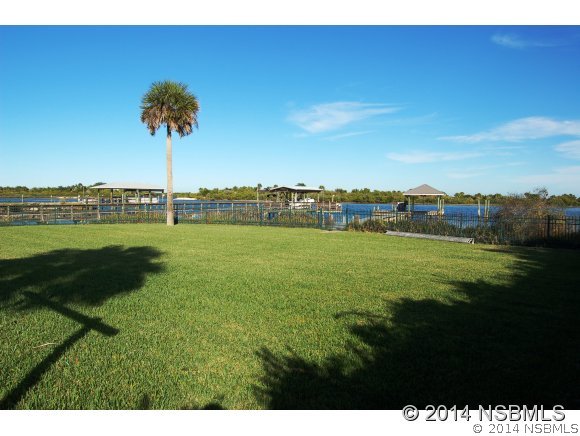 1719 South Riverside Drive Edgewater, FL 32132 - Photo 23 of 24 a view of a city and a lake