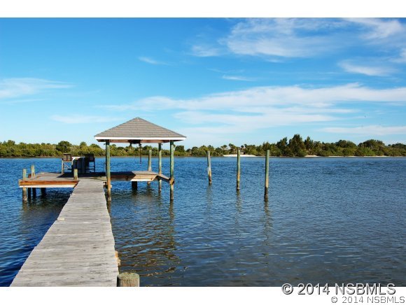 1719 South Riverside Drive Edgewater, FL 32132 - Photo 3 of 24 a view of swimming pool with outdoor seating and city view