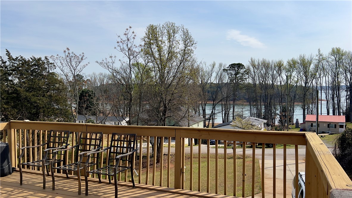 160 Hudgins Lake Road Townville, SC 29689 - Photo 38 of 41 Enjoy idyllic views of the expansive lake from this charming outdoor deck.