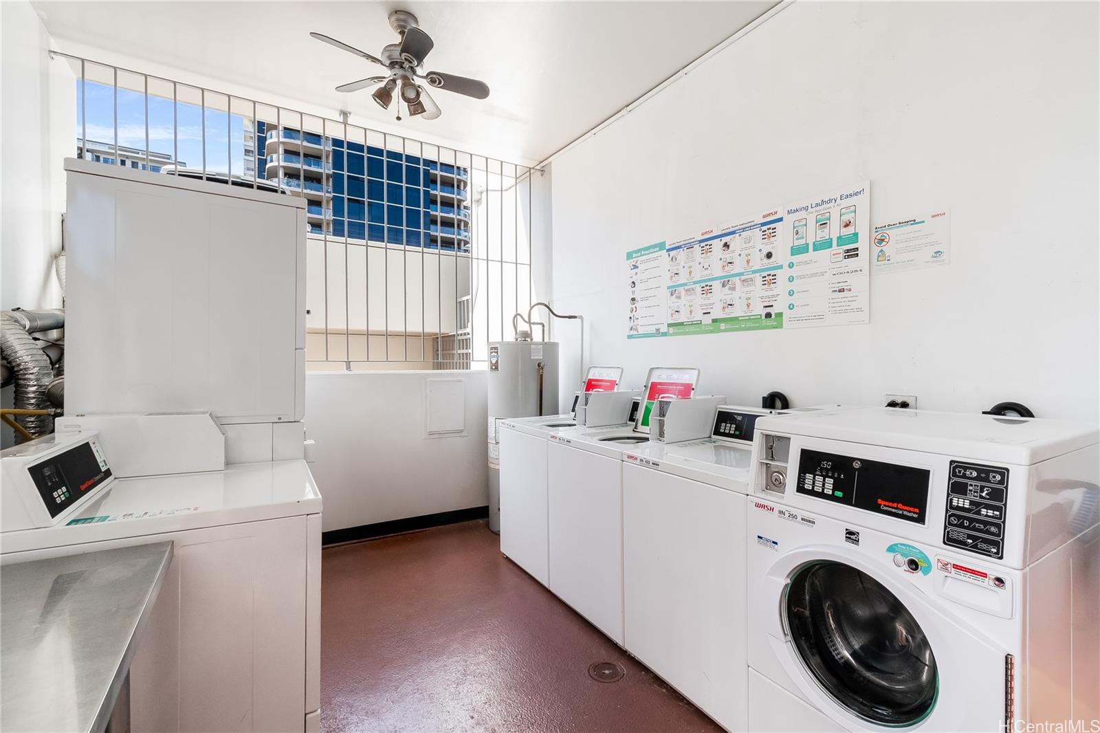 1069 Spencer Street, Unit 402 Honolulu, HI 96822 - Photo 13 of 15 a utility room with dryer and washer