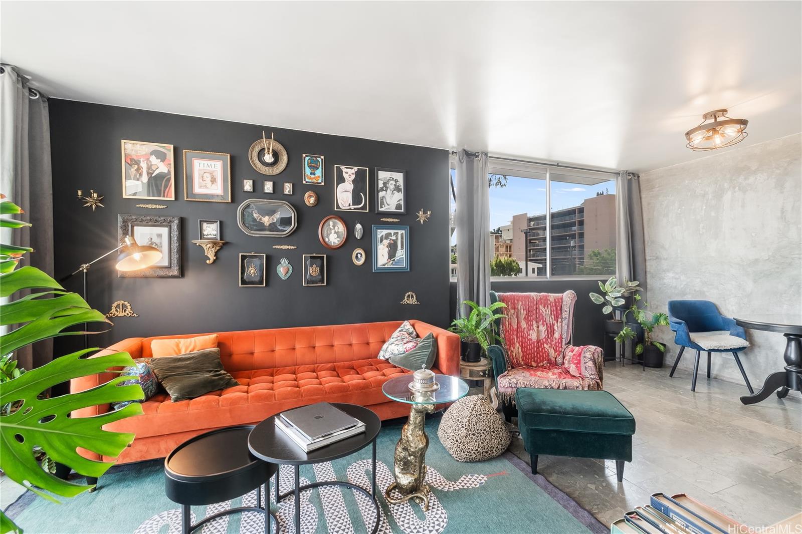 1069 Spencer Street, Unit 402 Honolulu, HI 96822 - Photo 3 of 15 a bedroom with furniture and a large window