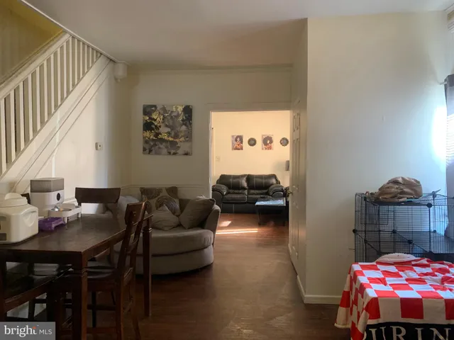 a white toilet sitting next to a shower and a sink