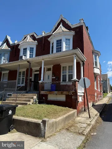 a front view of a house with a porch