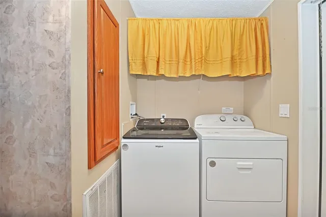 a view of swimming pool with a yard