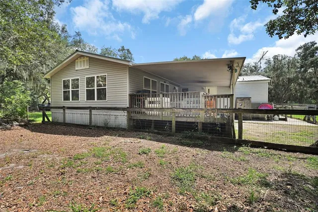 a view of storage and utility room with washer and dryer
