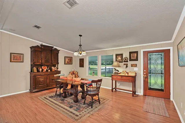 a bathroom with a sink toilet a mirror and shower