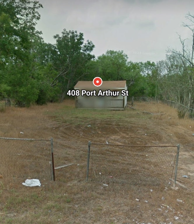 Community sign with fence