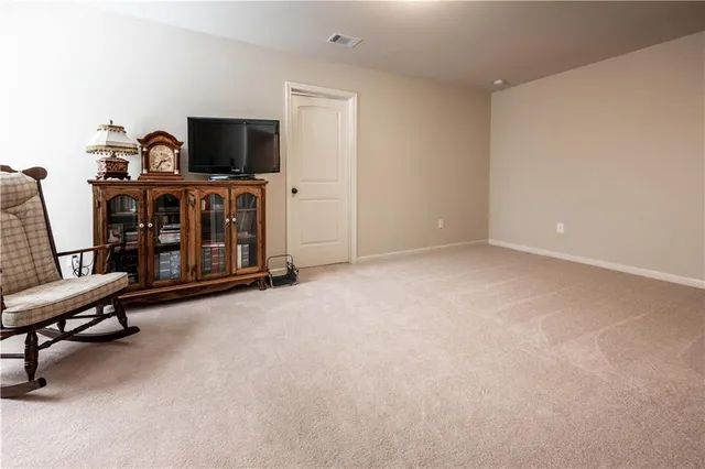 a view of a workspace with furniture