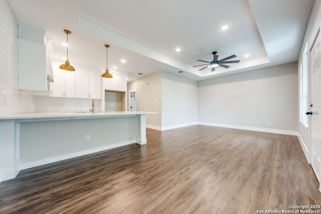 15935 Buchel LaCoste, TX 78039 - Photo 8 of 24 a view of a kitchen with a sink and dish washer