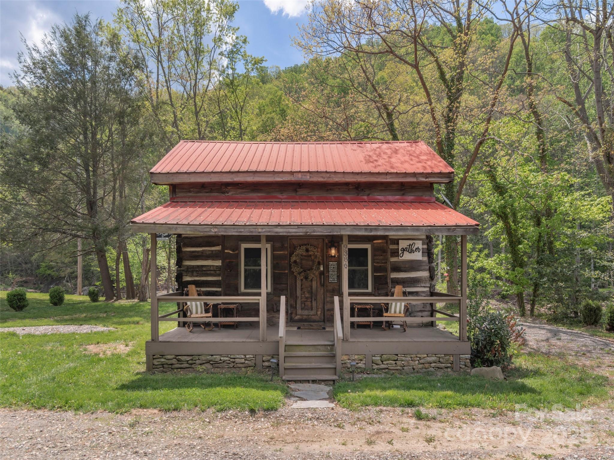 9386 Cruso Road Canton, NC 28716 - Photo 2 of 40 a view of a house with a yard balcony and large tree