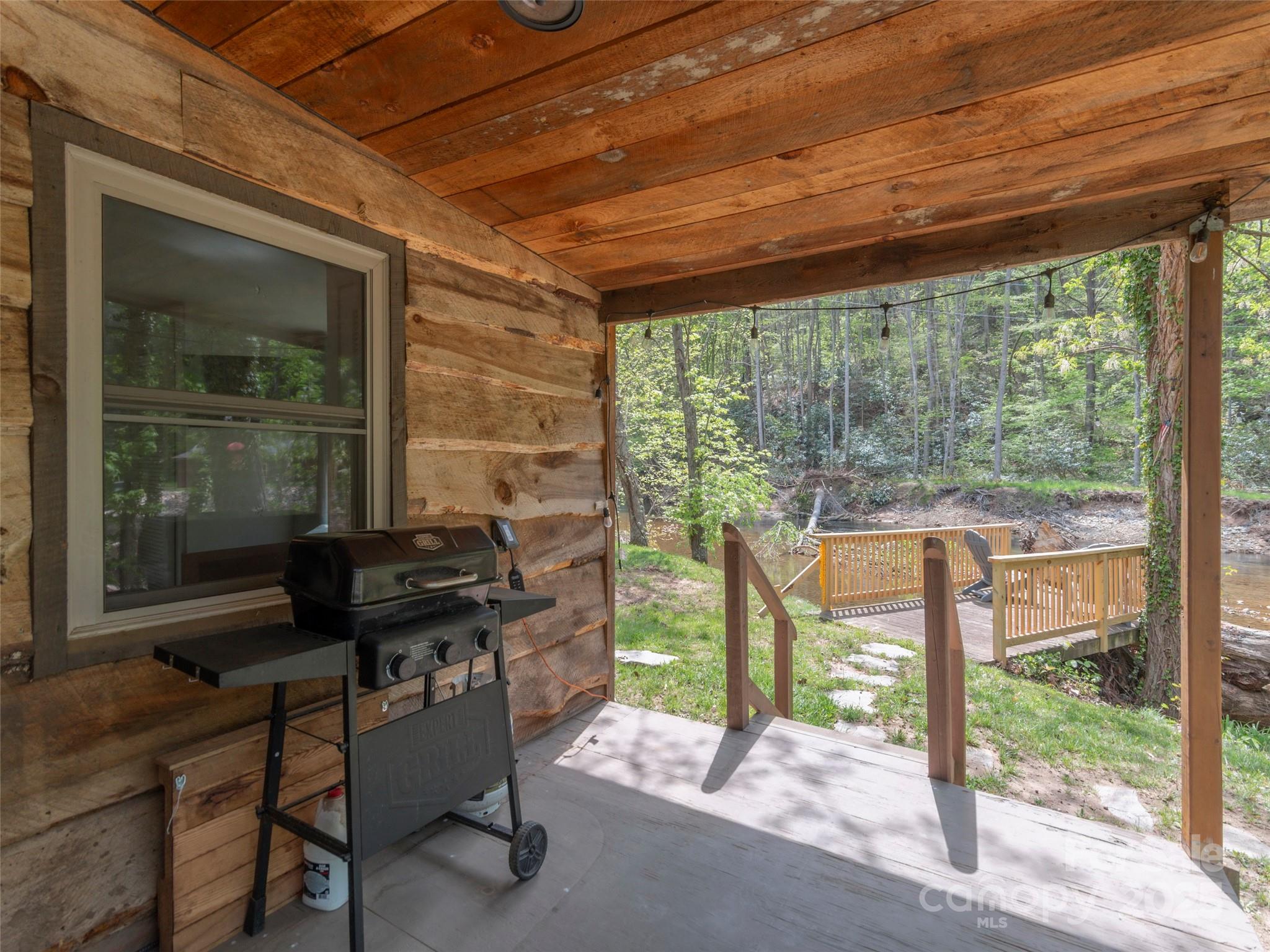 9386 Cruso Road Canton, NC 28716 - Photo 26 of 40 a house view with a sitting space and garden space