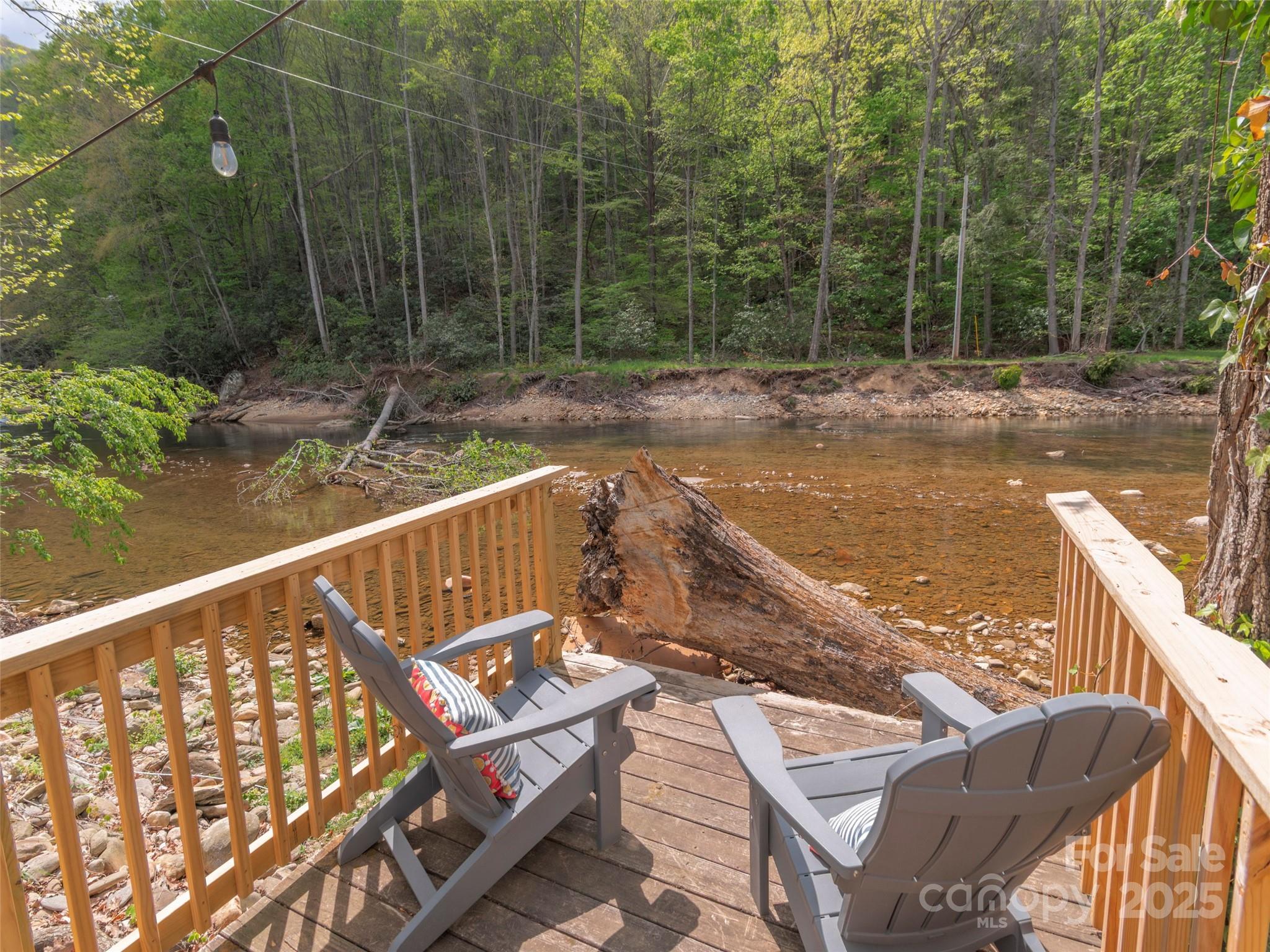 9386 Cruso Road Canton, NC 28716 - Photo 28 of 40 a view of a balcony with chairs
