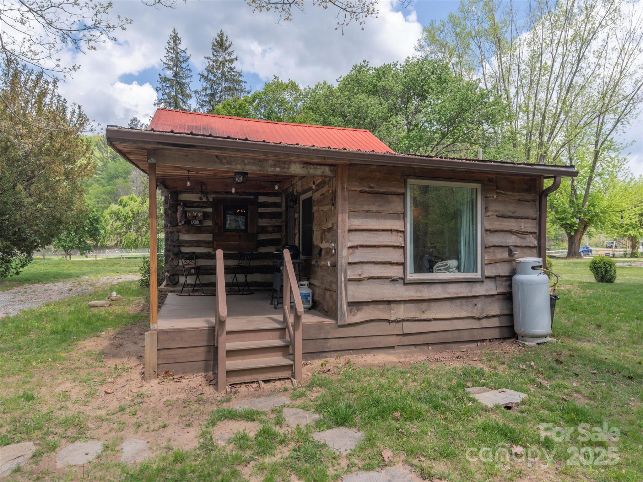 9386 Cruso Road Canton, NC 28716 - Photo 32 of 40 a view of a house with backyard